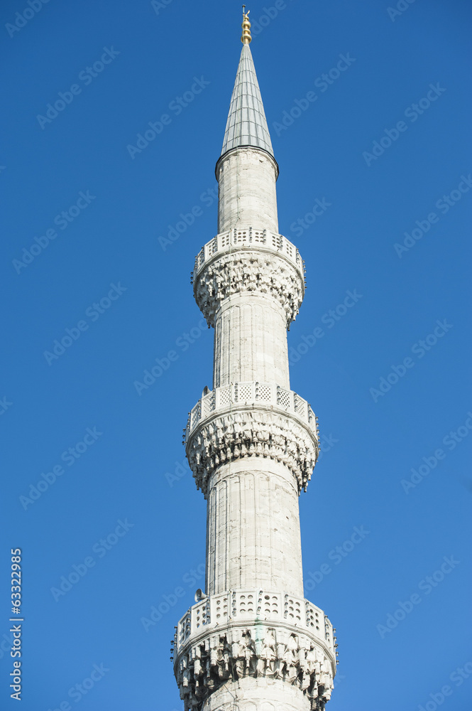 Obraz premium Minaret against blue sky background