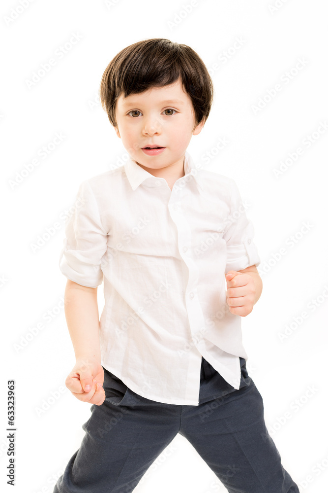 Little boy in a fighting stance