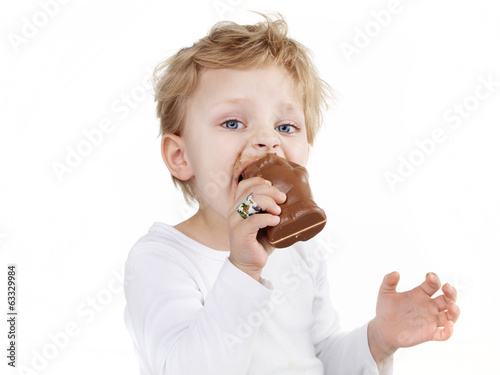Cute little boy with chocolate bunny