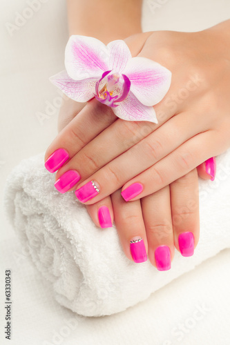 pink manicure on white