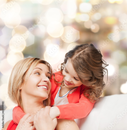 hugging mother and daughter