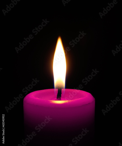 pink candle on black