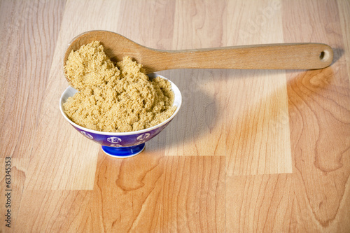 Sweet brown surgar in a bowl photo