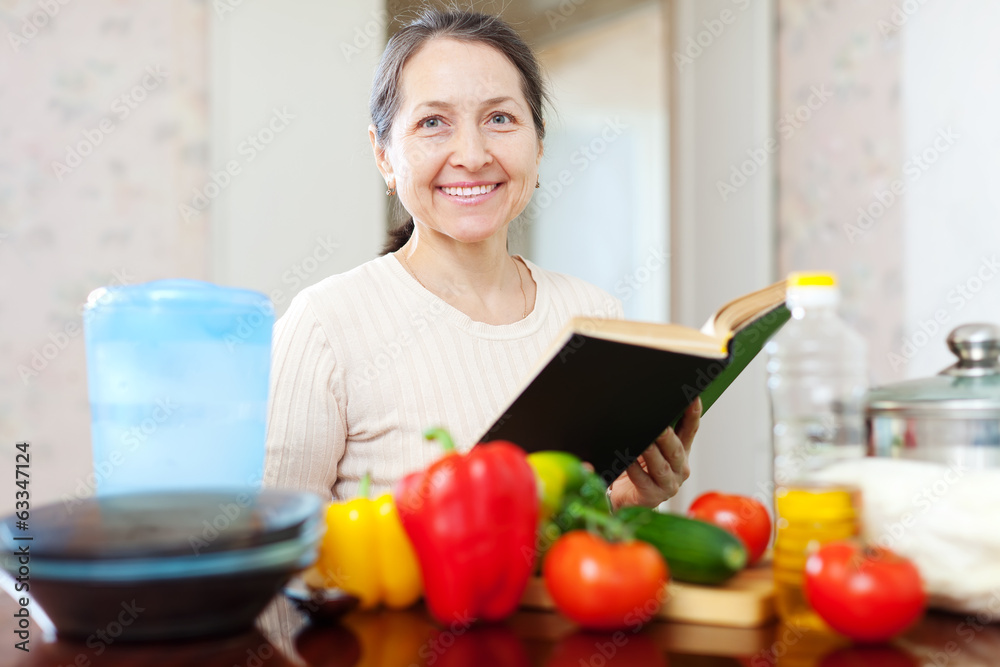  mature housewife reads cookbook