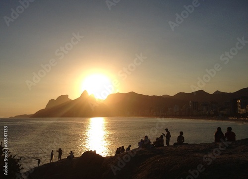 Silhouette of people looking at sunset in Rio de Janeiro