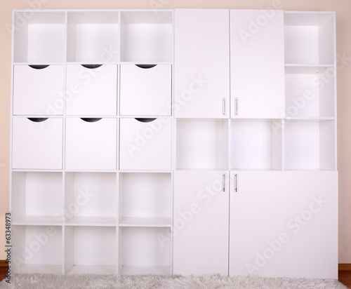 Empty white shelves close up