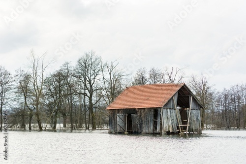 Barn surrounded with water