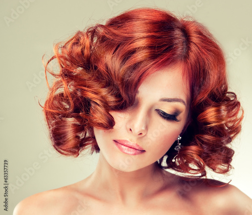 Beautiful model red with curly hair #63357739