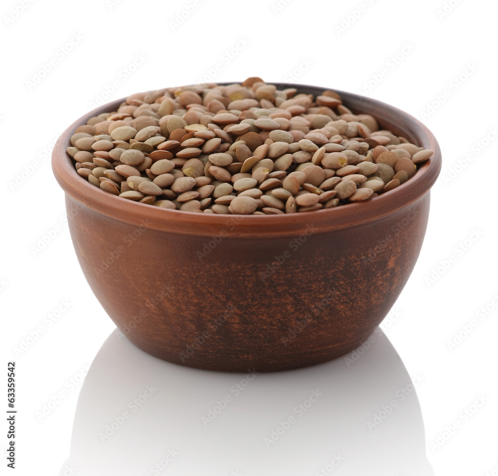 bowl of dried brown lentils bowl of dried brown lentils