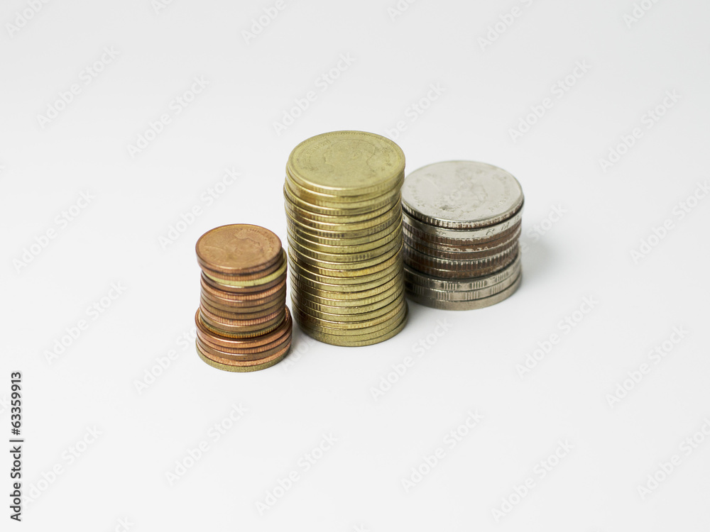 Coins stack with close up isolated on white background Coins stack with close up isolated on white background