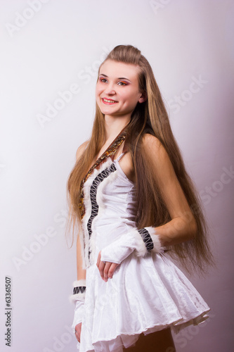 Portrait of a beautiful young woman with long hair