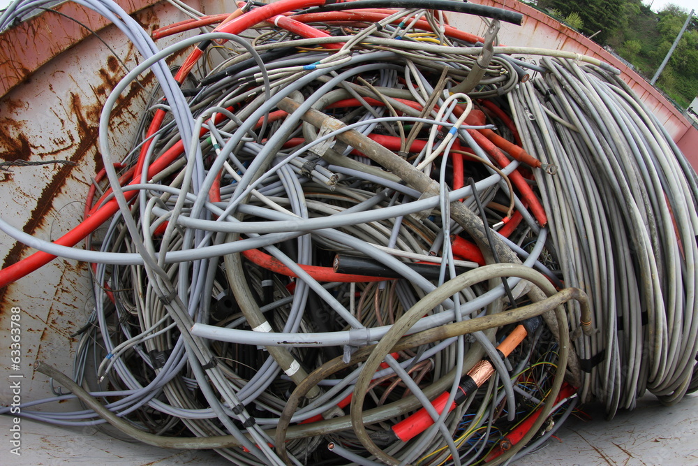 copper cable in a container of a landfill of recyclable waste
