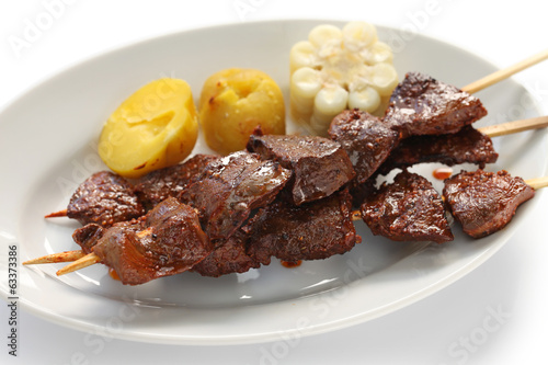 anticuchos, Peruvian cuisine, grilled skewered beef heart meat