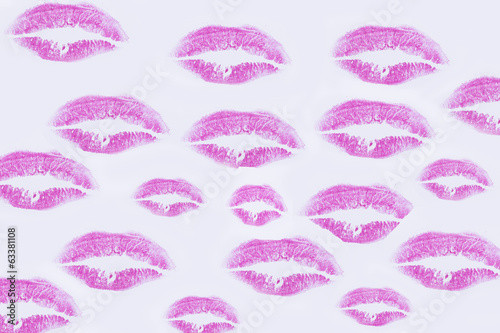 A wall filled with kisses of lipstick  wallpaper  background 