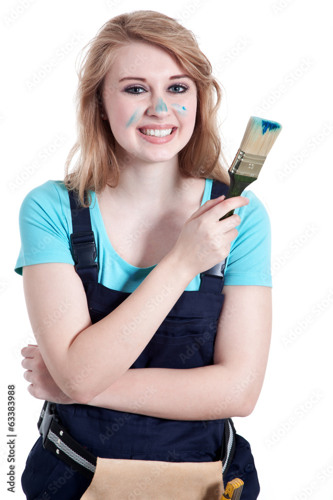 Junge Frau mit Pinsel und blauer Farbe Porträt Junge Frau mit Pinsel und blauer Farbe Porträt