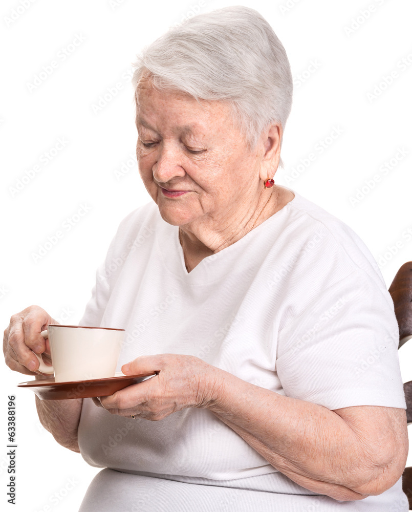 Old woman enjoying coffee or tea cup Old woman enjoying coffee or tea cup
