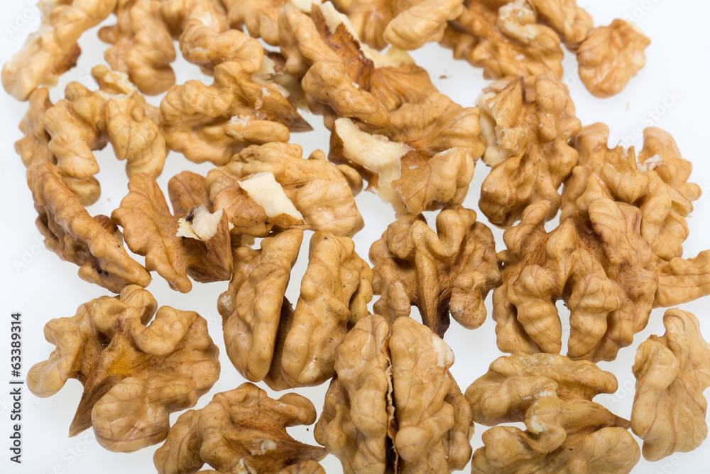 cracked walnut isolated on the white background cracked walnut isolated on the white background