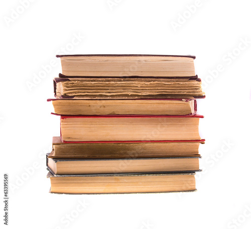 Pile of old books, isolated on white.