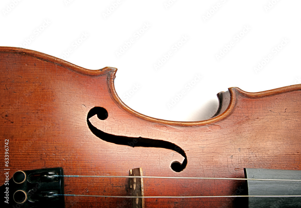 Old scratched violin on white background Old scratched violin on white background