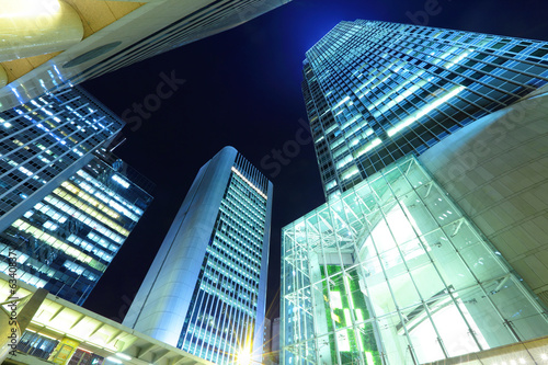 Skyscraper from low angle at night © leungchopan