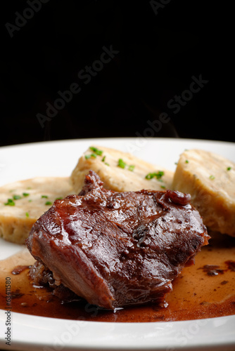 Veal fillet with rich sauce and bread dumplings photo