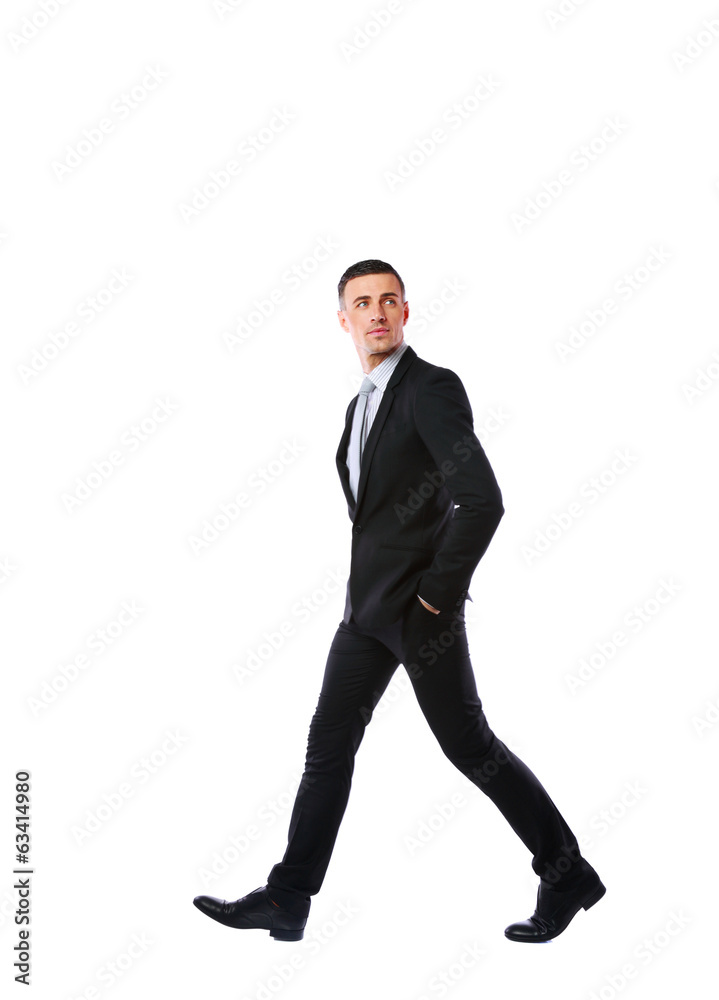 Side view portrait of a businessman walking Side view portrait of a businessman walking