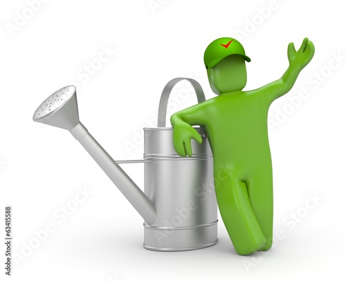 Worker with watering can photo