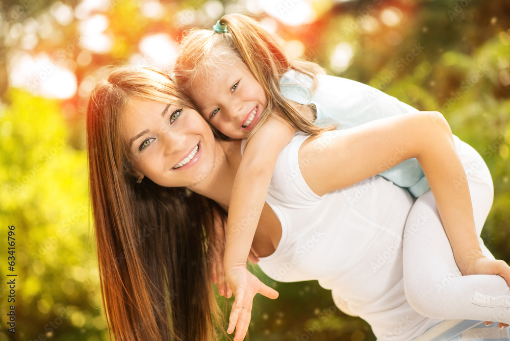 Mother and daughter in the nature Mother and daughter in the nature