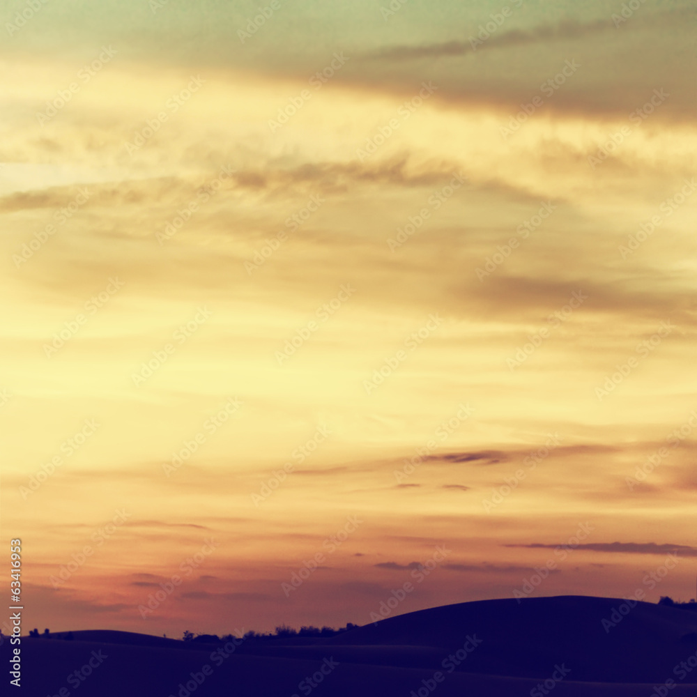 Obraz premium Beautiful sky with clouds at sunset. Filtered image