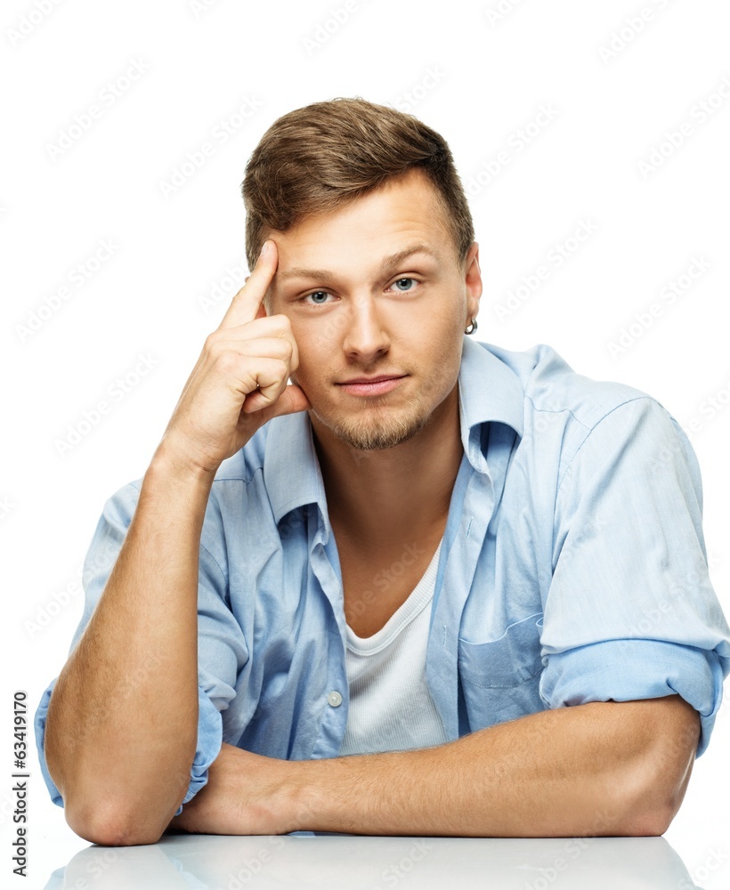 Stylish man in blue shirt with earring isolated on white Stylish man in blue shirt with earring isolated on white