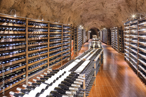 Obraz na płótnie Wine cellar with wine bottle and glasses