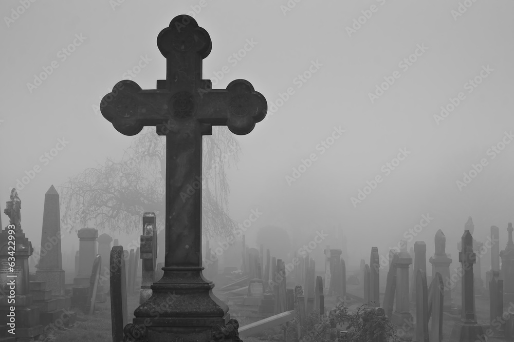 A Cross in ancient an graveyard A Cross in ancient an graveyard