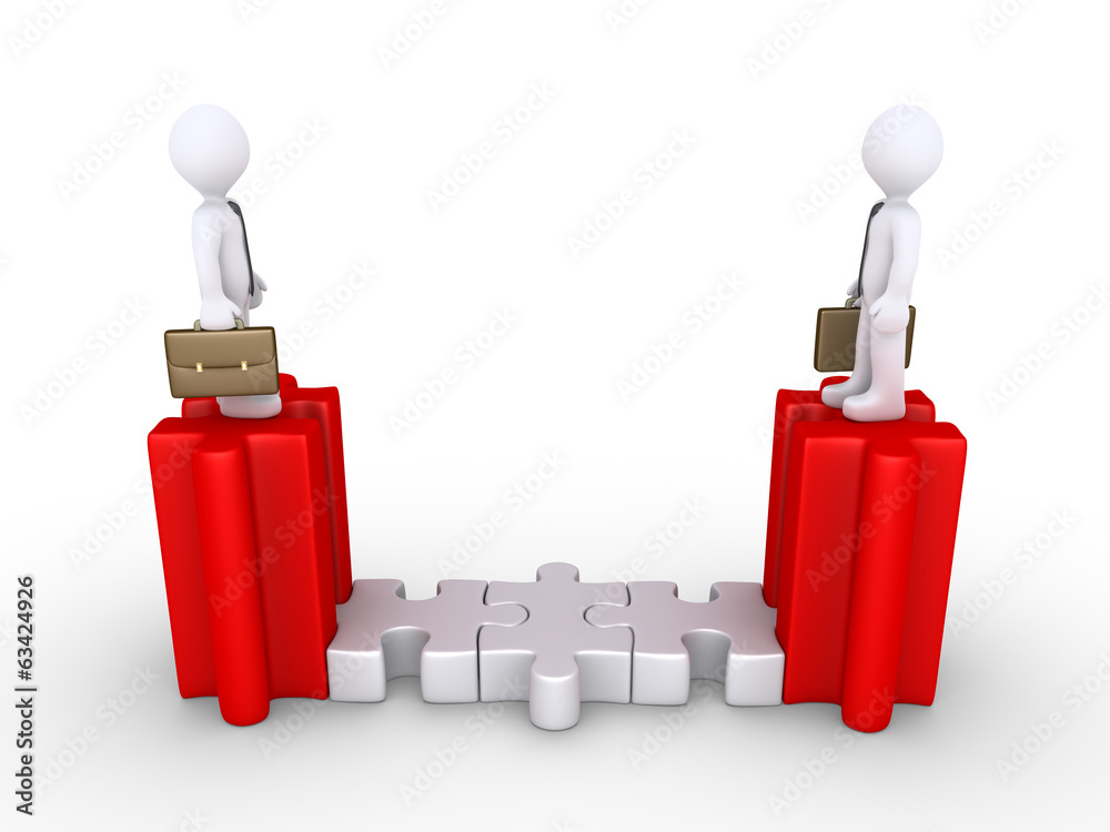 Businessmen connected with puzzle pieces