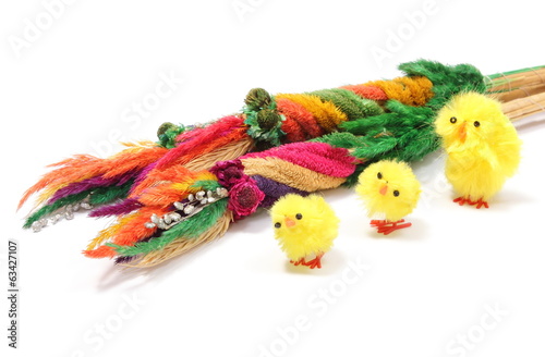 Easter chickens with colorful palm on white background