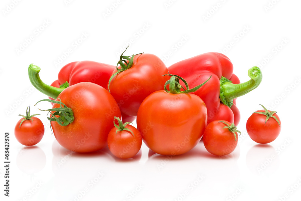 ripe tomatoes of different varieties and red pepper on a white b ripe tomatoes of different varieties and red pepper on a white b