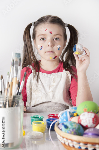 Cute little girl with easter egg photo