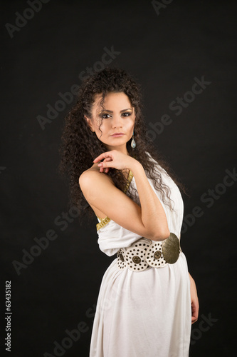 Portrait of a cute curly brunette