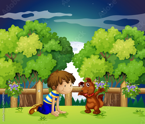 A boy and his pet playing outdoor