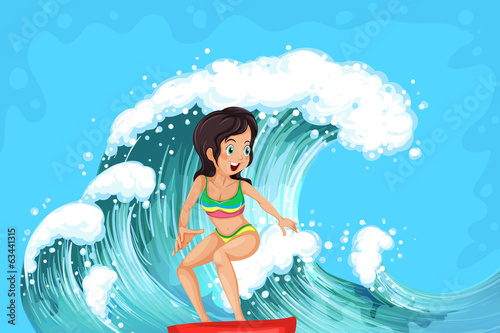 A brave girl surfing