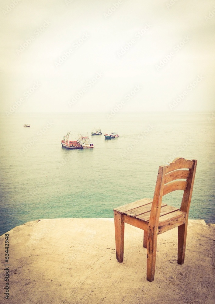 Panorama sea view with a wooden chair
