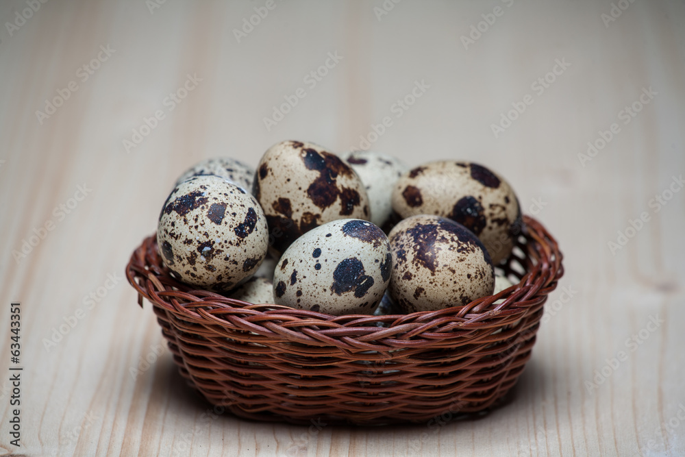Fototapeta premium Easter still life with eggs in a basket.