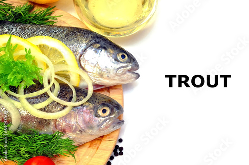 trout on a plate with vegetables