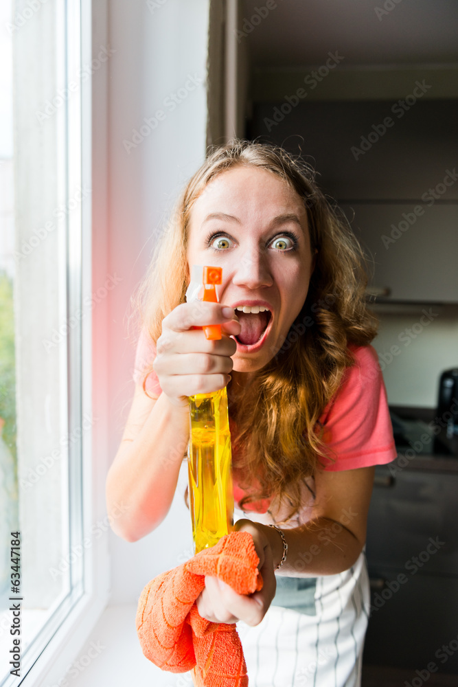 crazy woman housewife washes a window crazy woman housewife washes a window