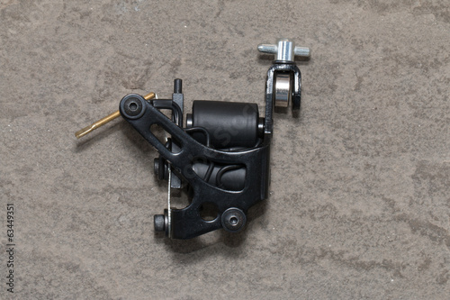 Tattoo machine ( gun ).