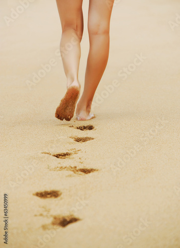 trail barefoot feet in the sand