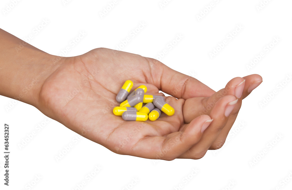 Medicine capsules on hand Medicine capsules on hand