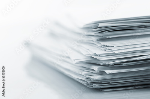 Stack of white papers photo
