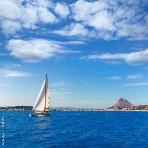 Fototapeta Naklejka Na Ścianę i Meble -  Javea sailboat sailing in Mediterranean Alicante Spain