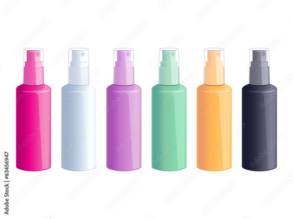 Set of colorful spray bottles on white background.