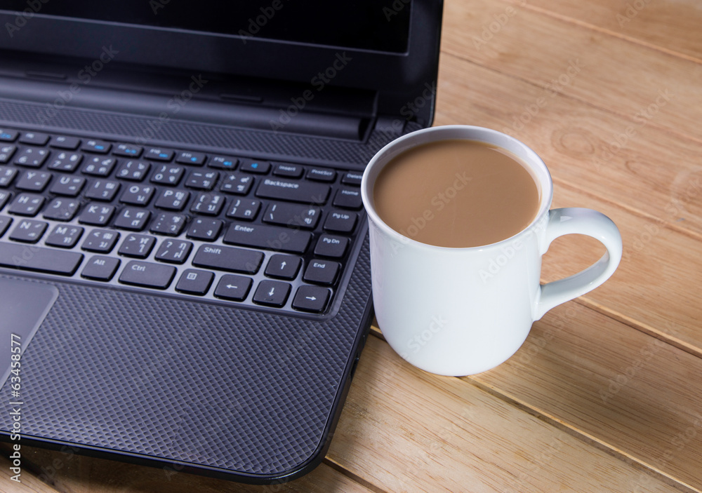 Coffee cup with the computer. Coffee cup with the computer.